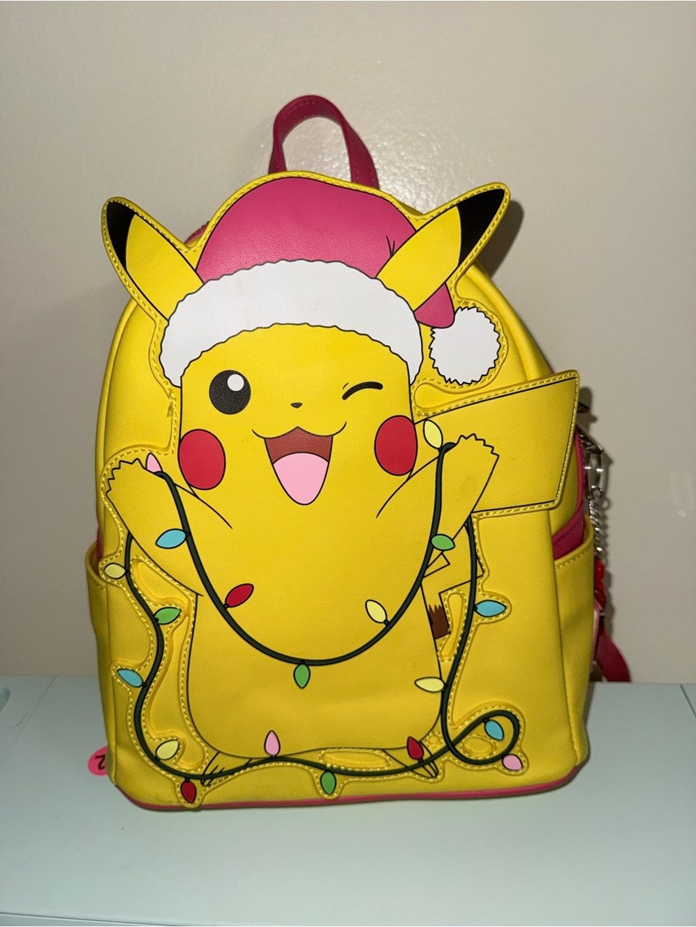 Loungefly Yellow Pikachu Mini Backpack with Pink Santa Hat